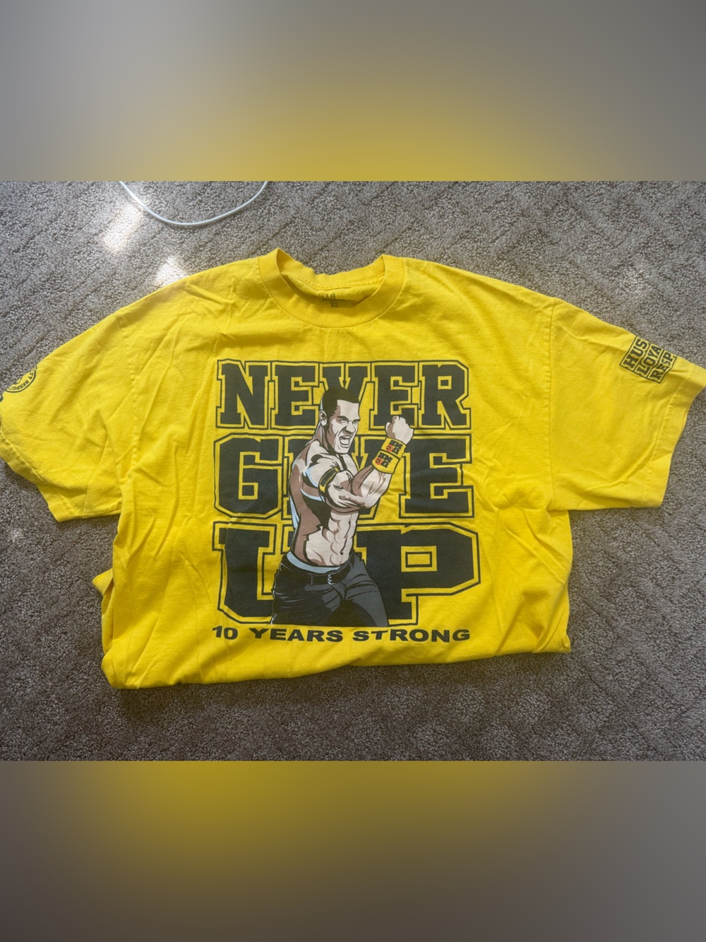 Authentic WWE Yellow "Never Give Up" Graphic adult Tee